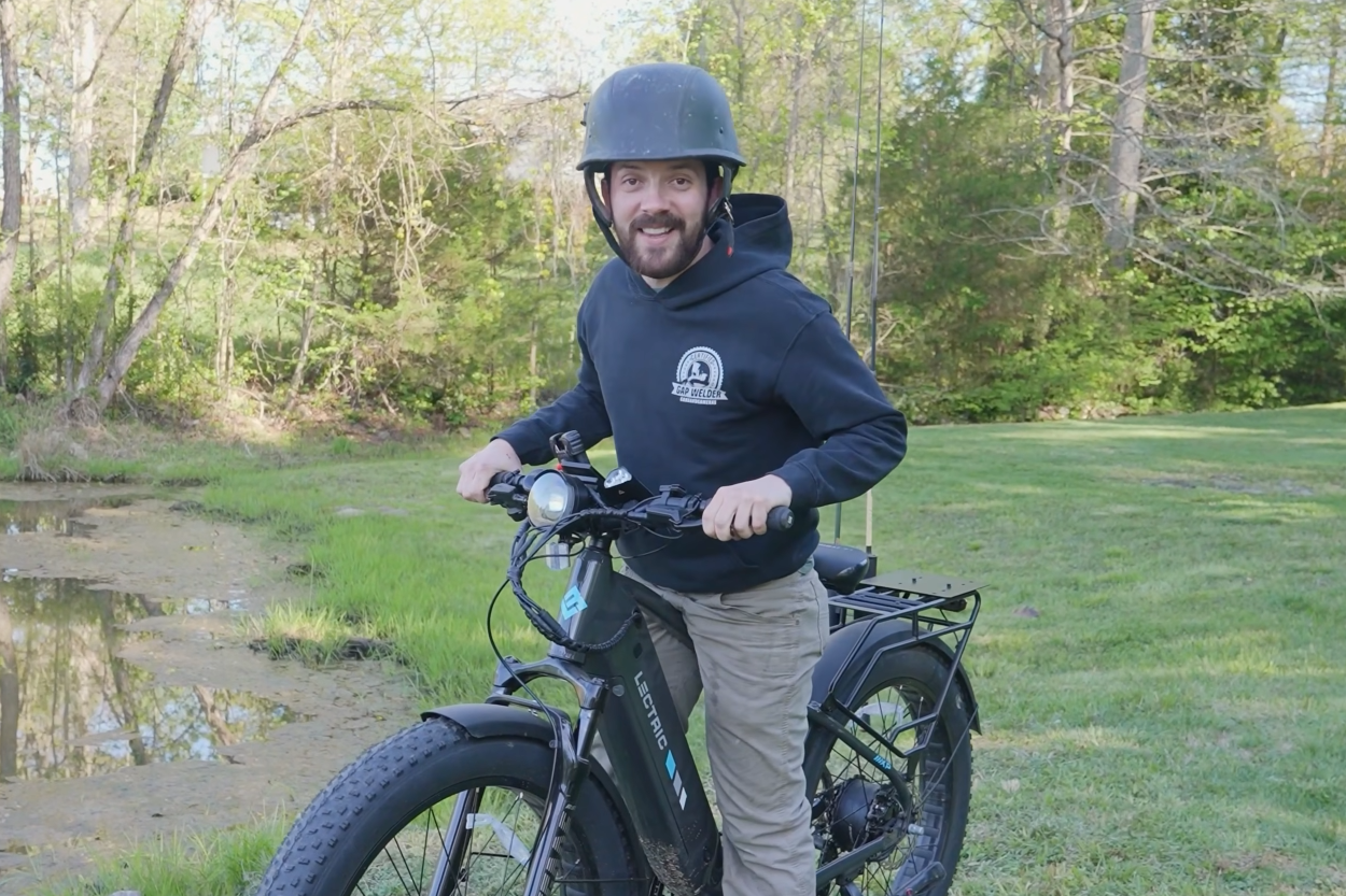 Creator riding a Lectric e-bike outdoors